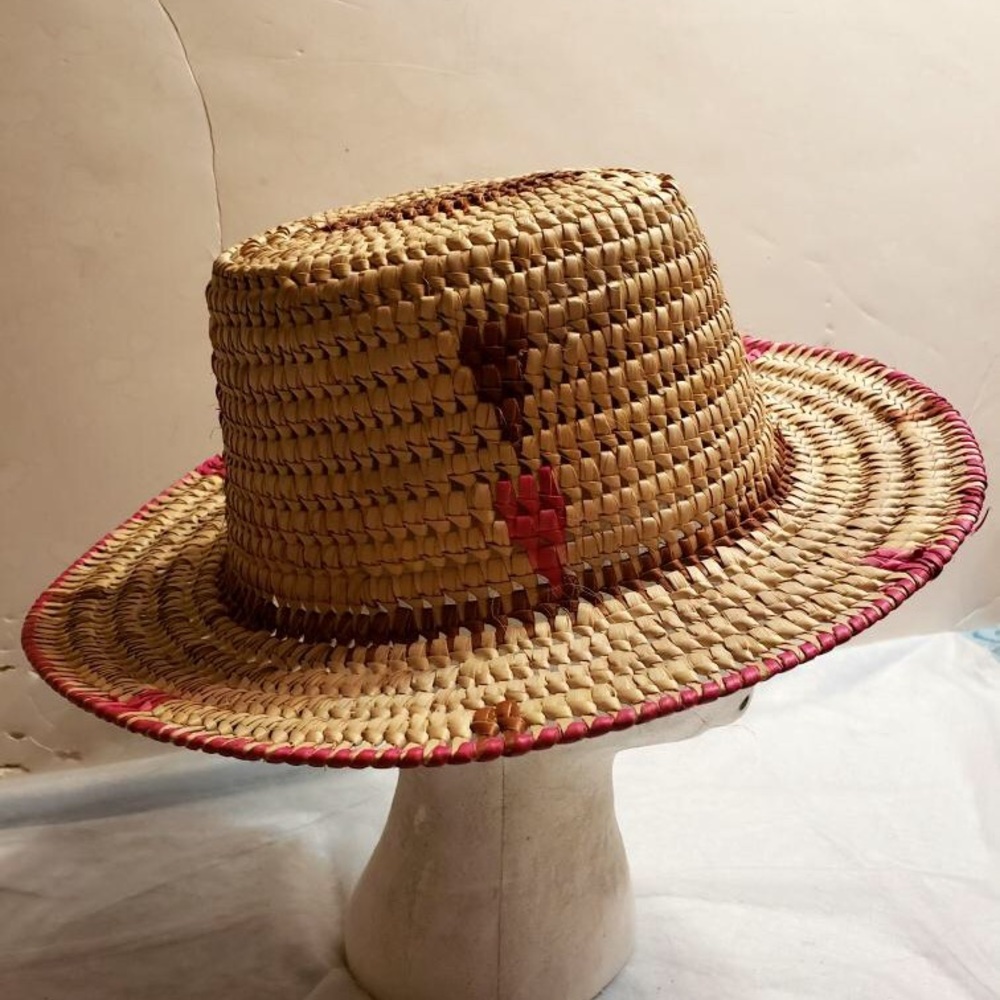Woven hat is hand made and is 9 inches